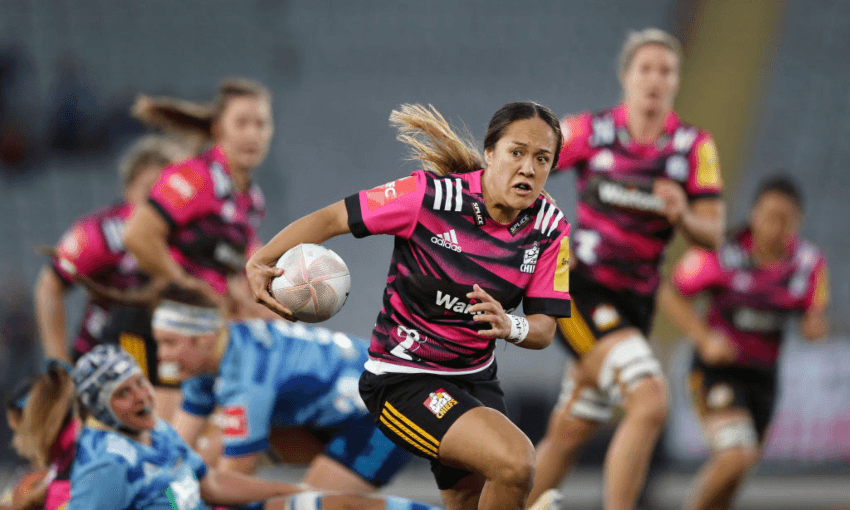 Arihiana Marino-Tauhinu of the Chiefs makes against the Blues at Eden Park. The Chiefs triumphed 37-12. 
(Photo by Anthony Au-Yeung/Getty Images) 
