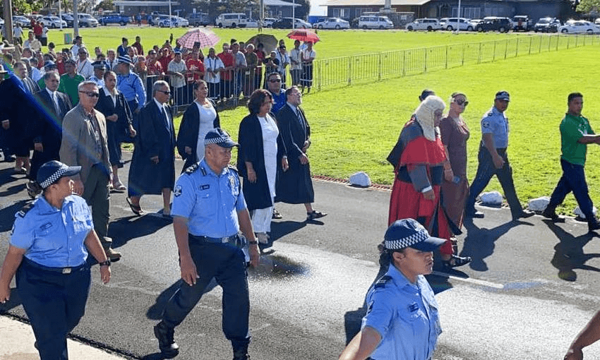 Chief Justice Satiu Simativa Perese is accompanied by the Police Commissioner and Judges of the Court on their way to Parliament only to find it closed. Photo: Keni Lesa 

