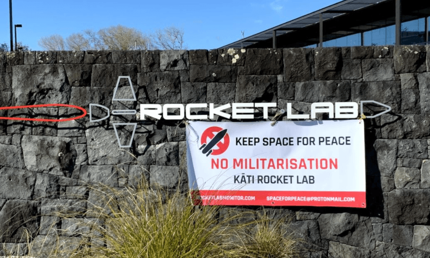 A protest banner at the Rocket Lab premises in Mt Wellington. Photo: Ollie Neas  
