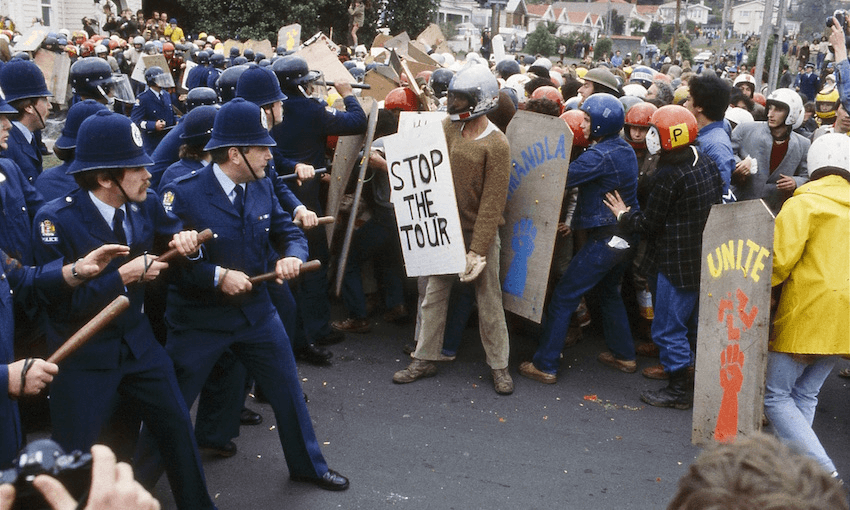 Police bear down on protestors at the third test between the Springboks and the All Blacks Mt Eden, September 1981. (Image: John Miller) 
