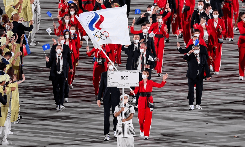 What country is ROC? The short answer: Russia. Here flagbearers Sofya Velikaya and Maxim Mikhaylov lead their team at the Tokyo 2020 Olympics opening ceremony. (Photo By Stephen McCarthy/Sportsfile via Getty Images) 
