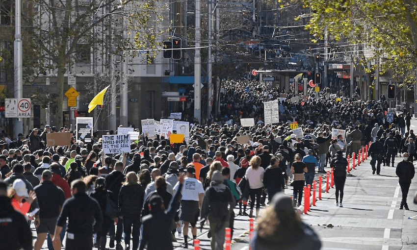 Thousands of anti-lockdown protestors march on the streets of Sydney CBD on July 24, 2021 (Photo: STEVEN SAPHORE/AFP via Getty Images) 
