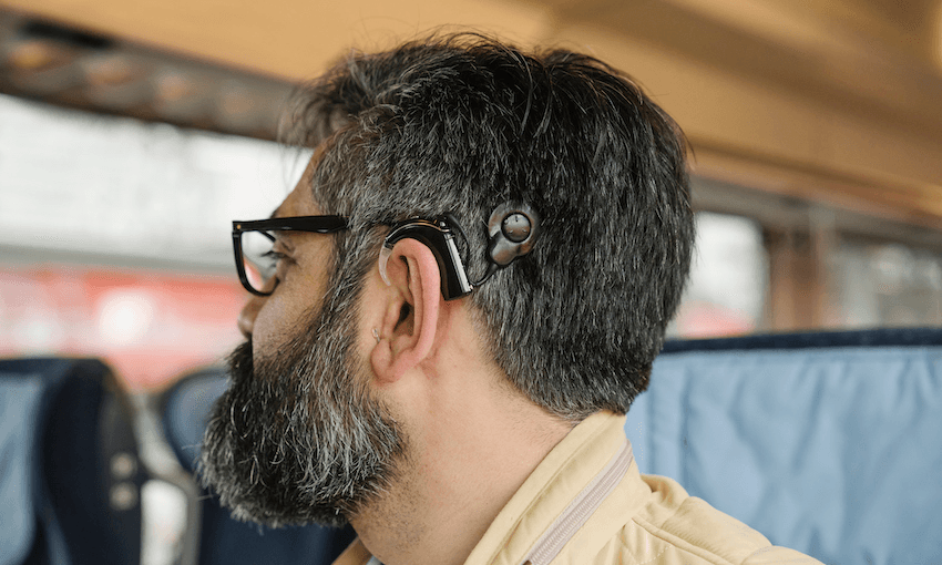 Man with cochlear implant