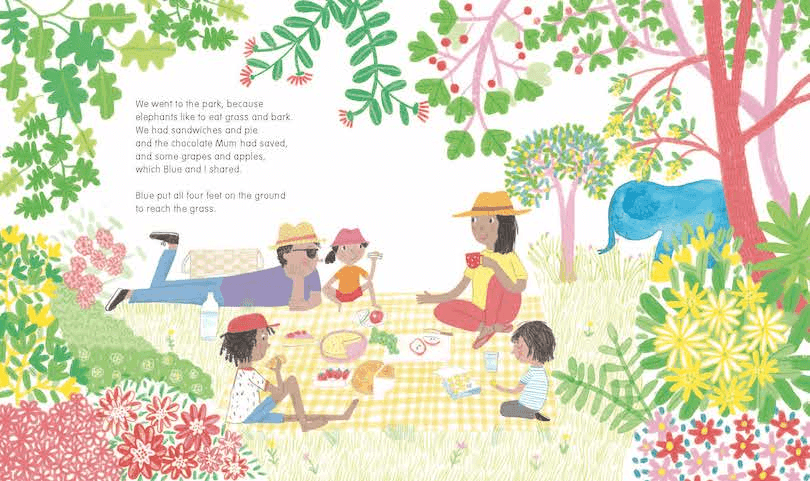 A spread from a picture book showing a family picnic, loads of flowers and trees, a blue elephant standing off to the side