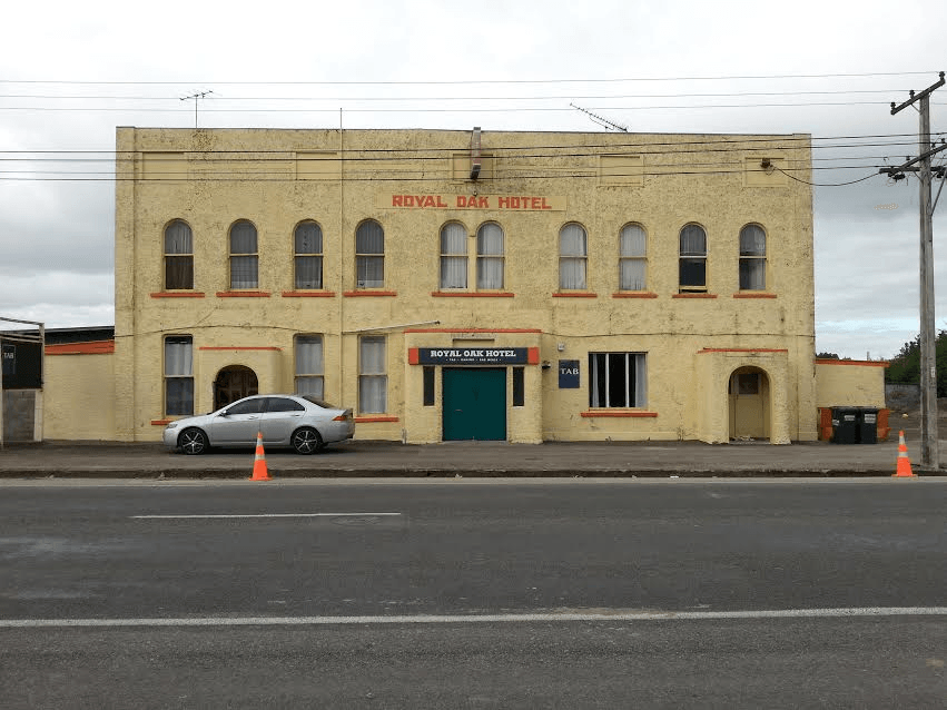 Photograph of a grey day in Featherston, and the frontage of the Royal Oak Hotel