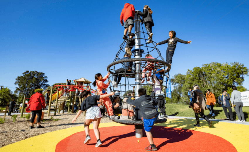 Children playing on the new playground at Toetoe-roa/Cooper Park at its opening on July 3. (Photo: Auckland Council)