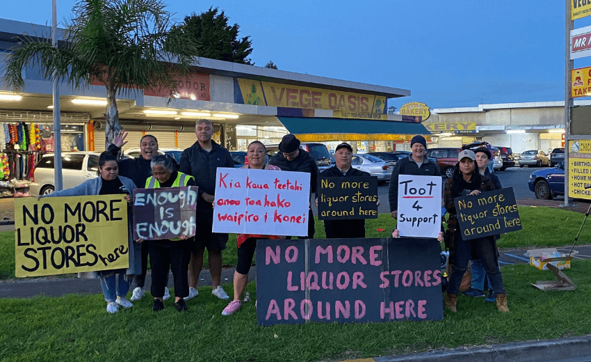 Members of Communities Against Alcohol Harm protesting outside a liquor store in Ōtara, July 2021. (Photo: Justin Latif) 
