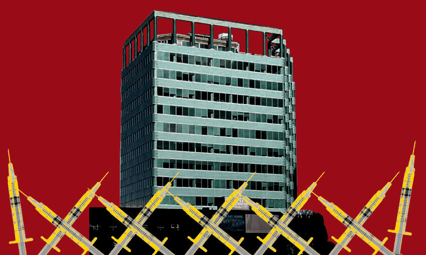 A office block surrounded by vaccine needles