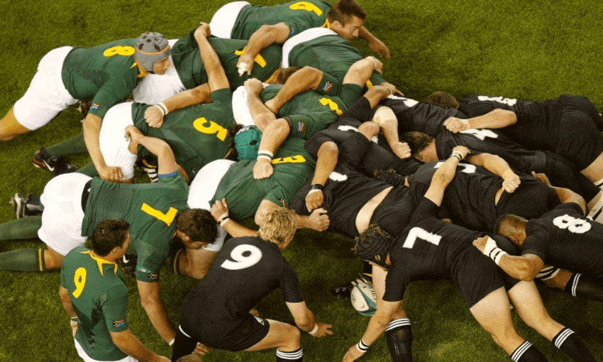 The Springboks and the All Blacks pack down in a 2003 World Cup clash in Melbourne. Tonight the sides meet for the 100th time. Photo by David Davies/PA Images via Getty Images 
