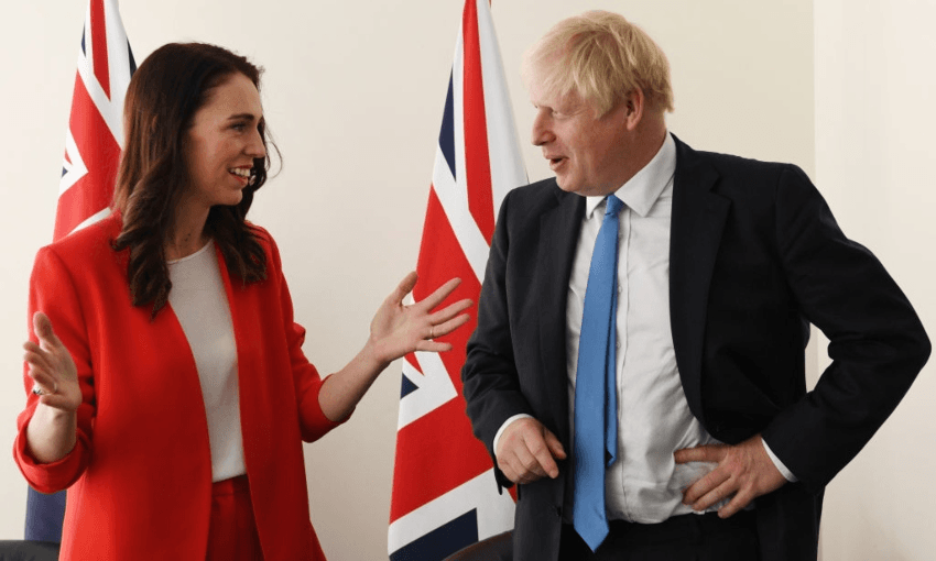 Boris Johnson and Jacinda Ardern in a discussion about, possibly, fishing, at the UN in New York, 2019. (Photo by Stefan Rousseau/PA Images via Getty Images) 
