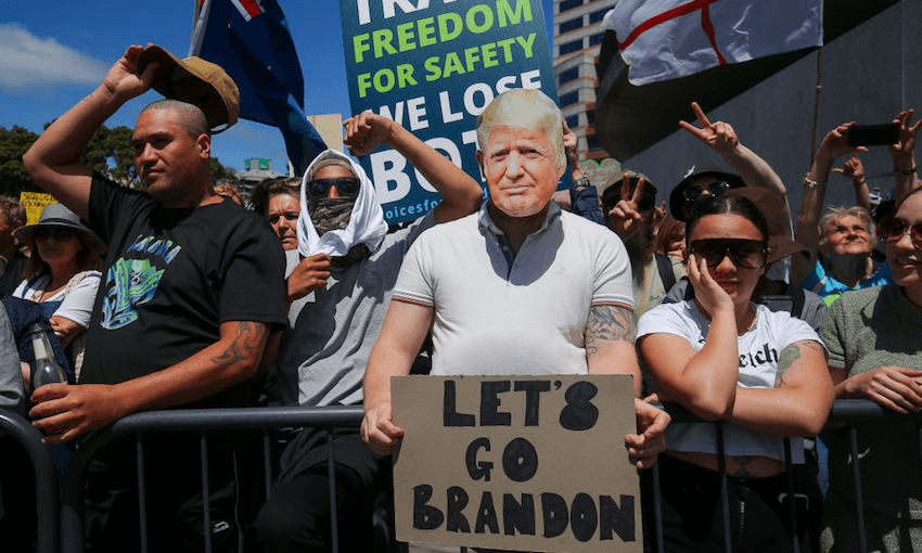 A protestor wears a Donald Trump face mask during a Freedom and Rights Coalition protest at parliament on November 9 (Photo by Hagen Hopkins/Getty Images) 
