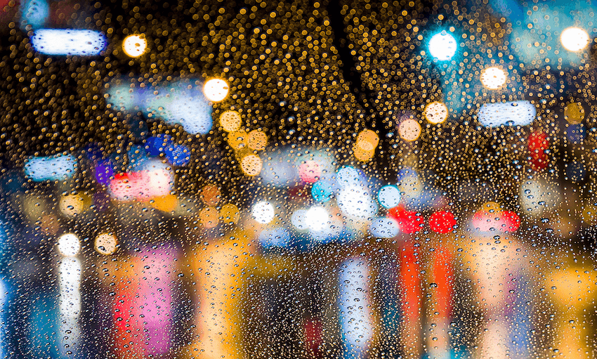 A rainy city street at night