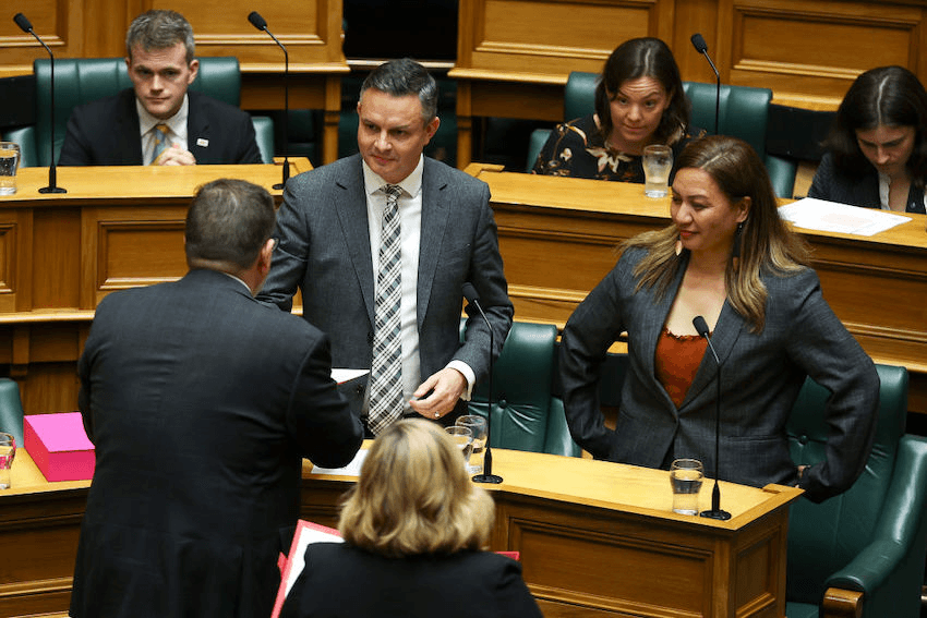 Then finance minister Grant Robertson delivering a copy of the 2021 budget to Green co-leaders James Shaw and Marama Davidson in parliament 