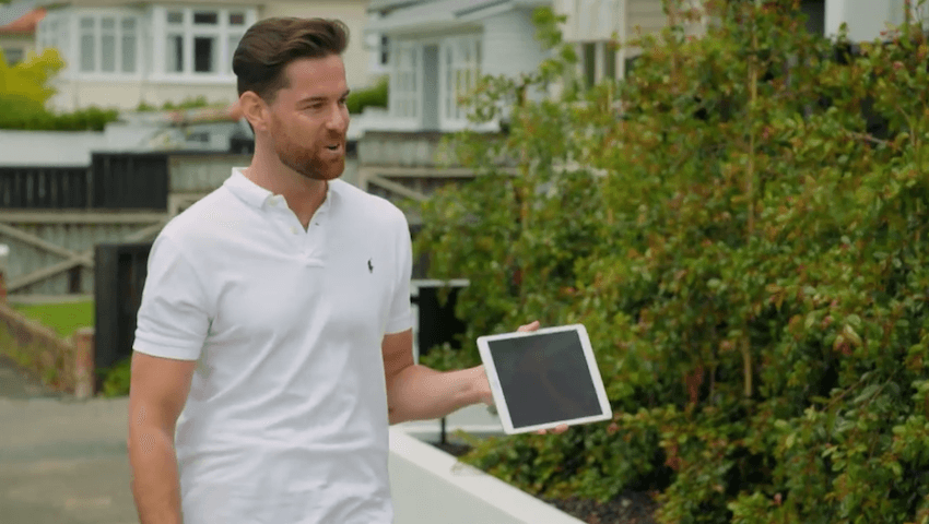 Dylan carries tiny Keegan in an iPad to see their new car