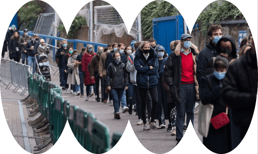 A queue at a vaccination hub at Chelsea FC’s Stamford Bridge stadium in London on December 18. The UK delivered record numbers of booster shots over the weekend as omicron continued its spread (Photo: Wiktor Szymanowicz/Future Publishing via Getty Images 
