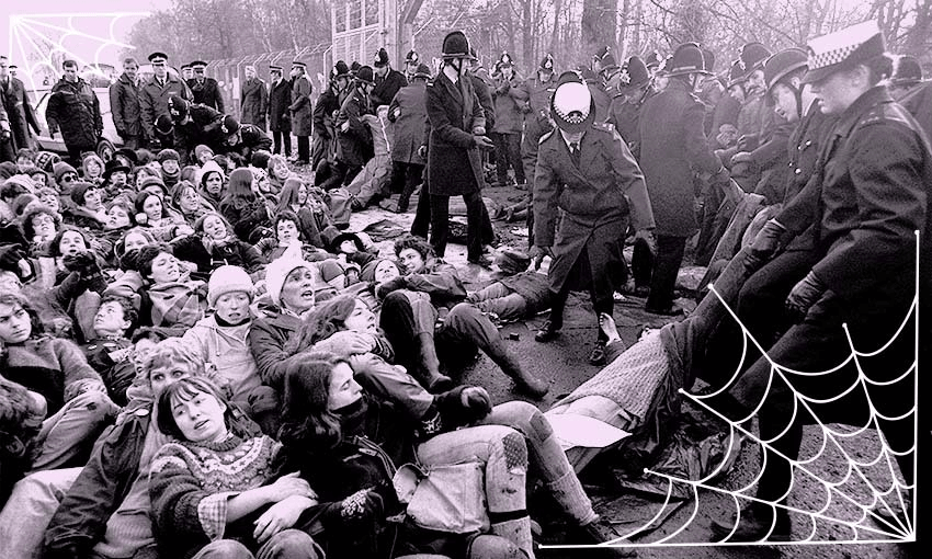 Protesters and police outside the Greenham Common airbase. (Image: Supplied/ Archi Banal) 
