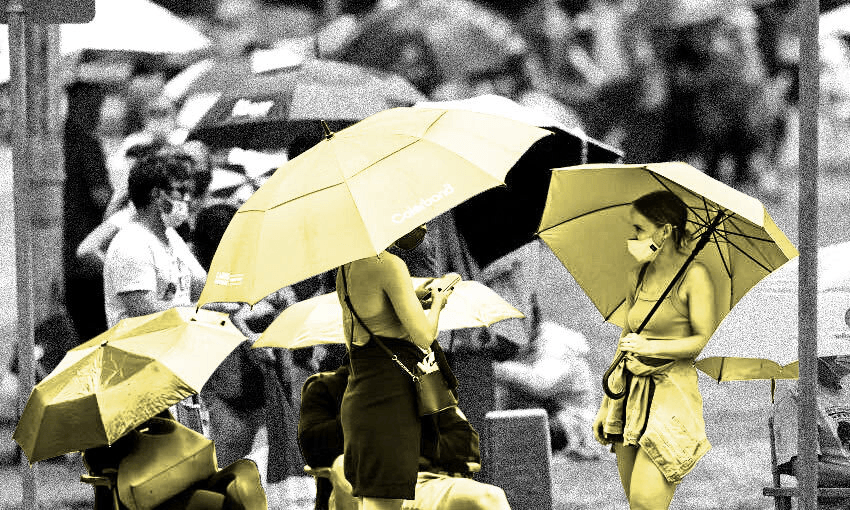 A testing queue on the Gold Coast (Photo: Chris Hyde/Getty Images; design by Tina Tiller) 
