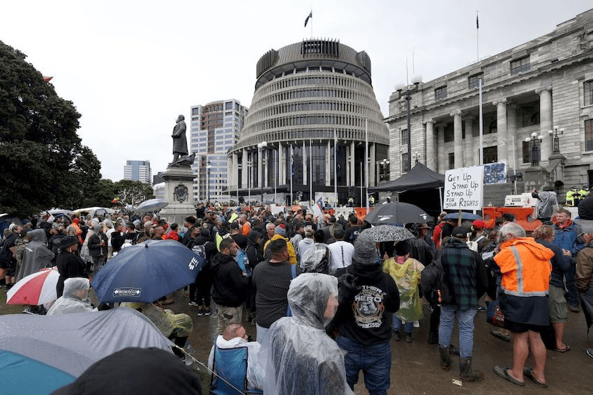 Protesters pack into the grounds of Parliament on the fifth day of demonstrations against Covid-19 restrictions in Wellington on February 12, 2022, inspired by a similar demonstration in Canada. (Photo by Marty MELVILLE / AFP) (Photo by MARTY MELVILLE/AFP via Getty Images) 
