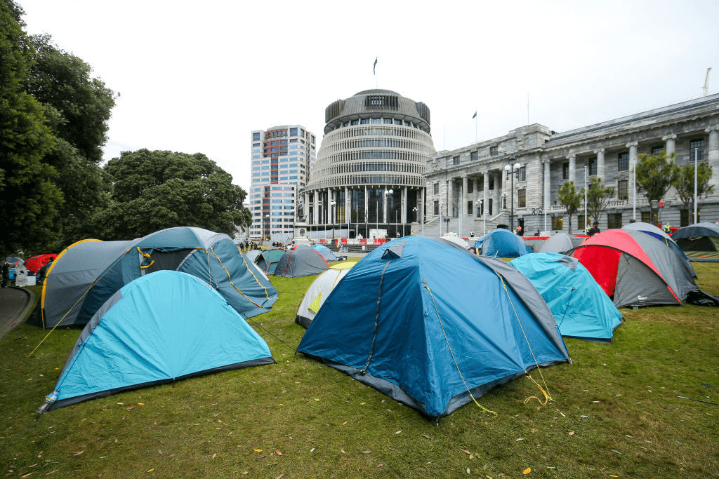 Tents pitched on parliament grounds on February 11, 2022. (Photo: Hagen Hopkins/Getty Images) 
