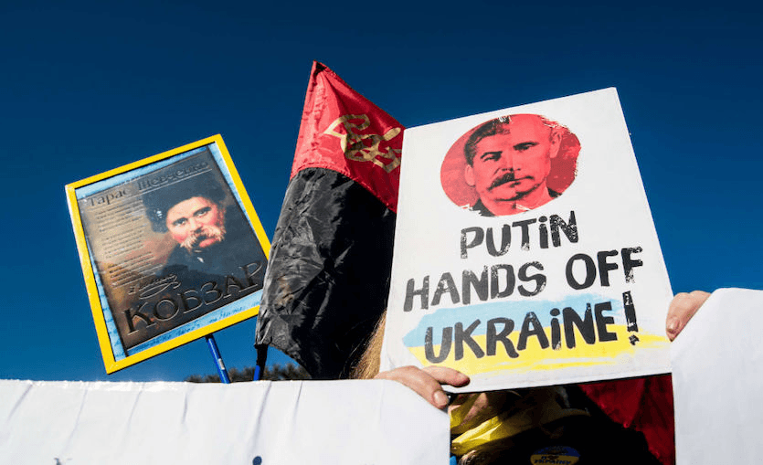 Protest signs against Russian aggression in Ukraine
