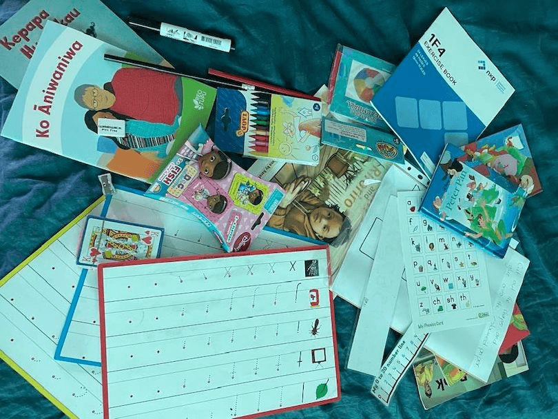 A photo of amazing primary school worksheets and activities, spread out like a cornucopia.