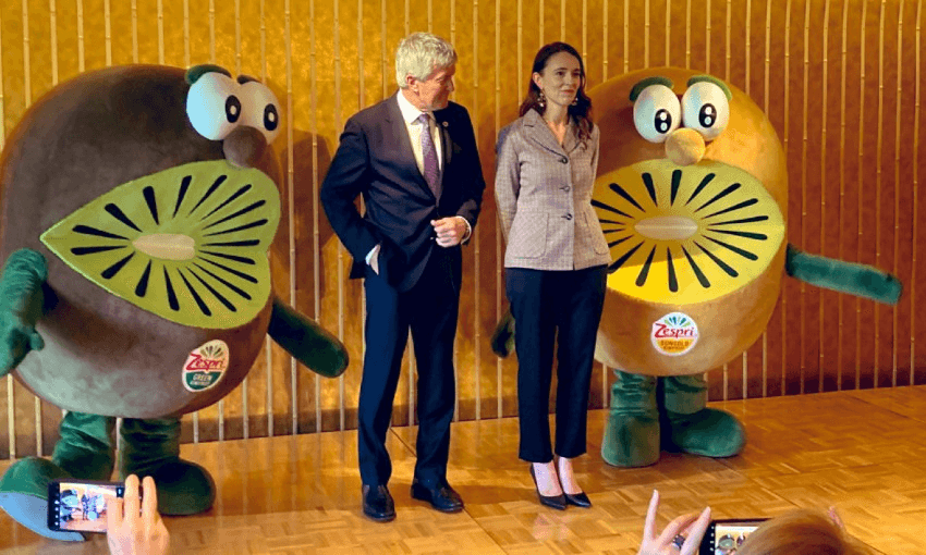 Jacinda Ardern poses with anthropomorphic kiwifruit in Japan | Apr 21 2022  | The Spinoff