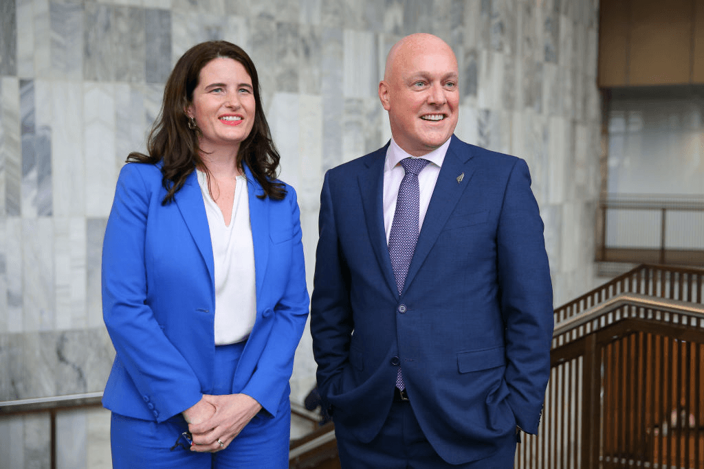 WELLINGTON, NEW ZEALAND – NOVEMBER 30: New National Party leader Christopher Luxon and deputy leader Nicola Willis pose after a press conference at Parliament on November 30, 2021 in Wellington, New Zealand. The New Zealand National party caucus selected Christopher Luxon as their new leader and Nicola Willis as deputy leader. Former party leader Judith Collins lost a vote of confidence last week, following her sudden decision to demote MP Simon Bridges over comments he was overheard making in 2016. (Photo by Hagen Hopkins/Getty Images) 
