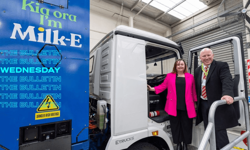 Megan Woods with Fonterra‘s Fraser Whineray and Milk-E (Photo RNZ/Supplied)