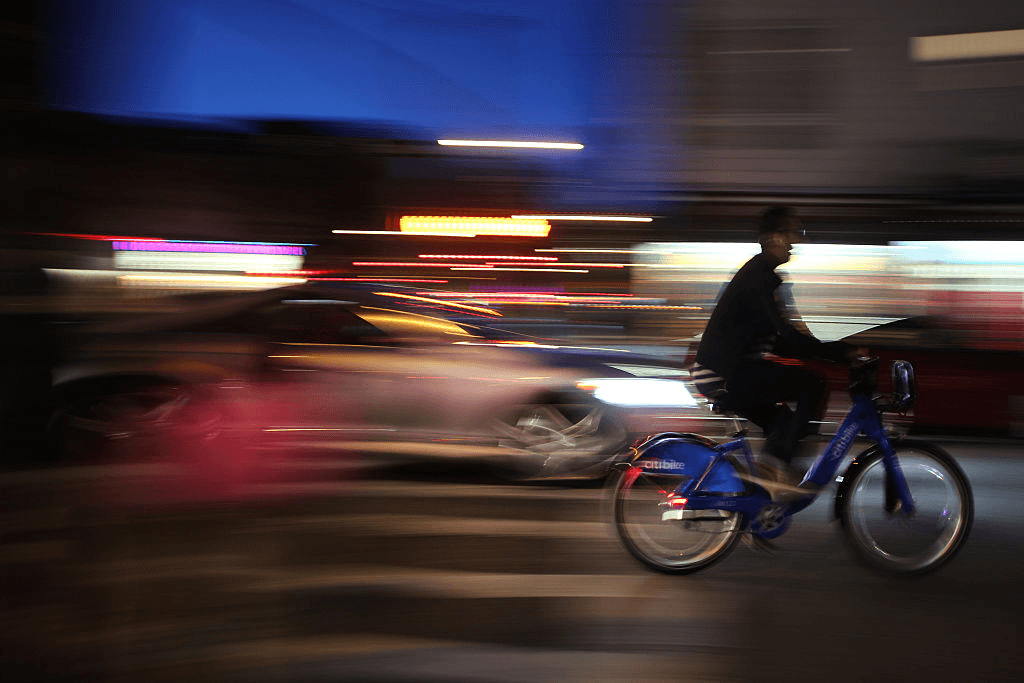 person biking at night