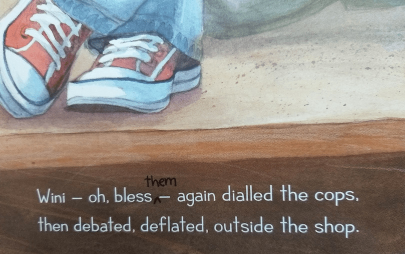 Picture book page showing just the feet of Wini (she's wearing red Converse) with a "they" inserted into the text below.