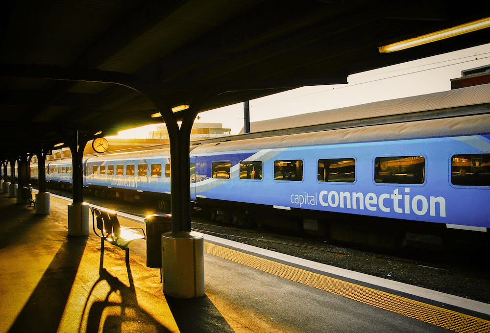 a bblue train in golden evening light