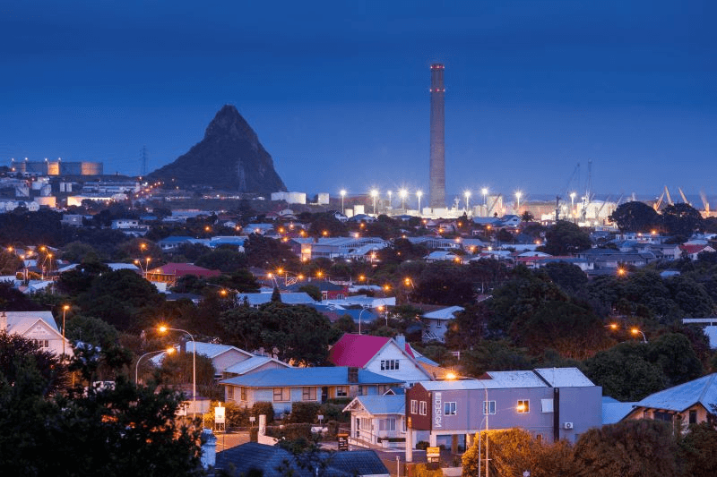A shot of New Plymouth at night, with Paritutu in the background