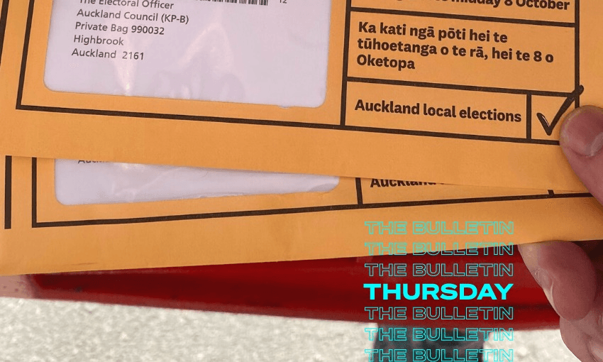 A man posts local election voting papers into endangered box (Photo: Troy Rawhiti-Connell) 
