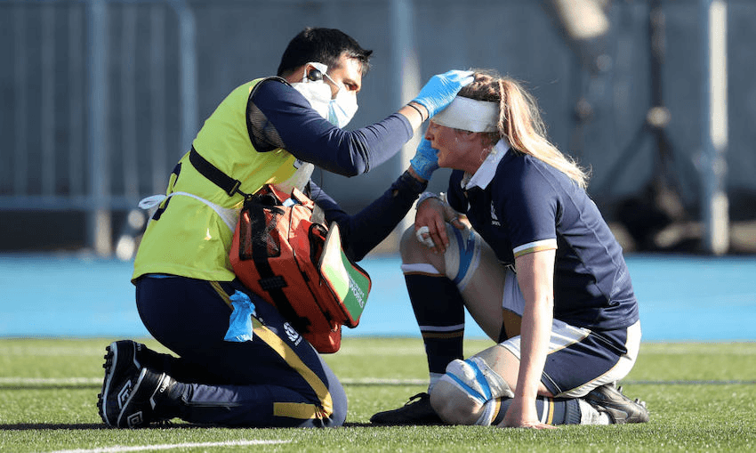 Scotland’s Siobhan Cattigan receives treatment for a head injury during the Guinness Women’s Six Nations match at Scotstoun Stadium, Glasgow, April 24, 2021. (Photo by Andrew Milligan/PA Images via Getty Images) 
