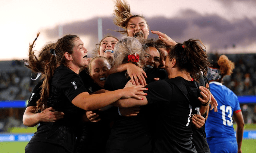 The Black Ferns celebrate a try against France (Photo by Hagen Hopkins/World Rugby via Getty Images) 
