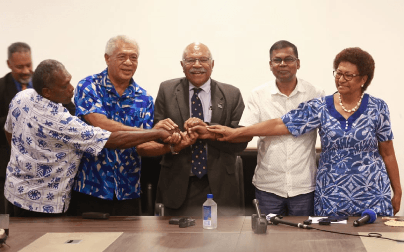 A coalition agreement has been signed – second from left Sodelpa chief negotiator Anare Jale, People’s Alliance leader Sitiveni Rabuka, National Federation Party leader Biman Prasad and Ro Teimumu Kepa (Photo RNZ/National Federation Party) 
