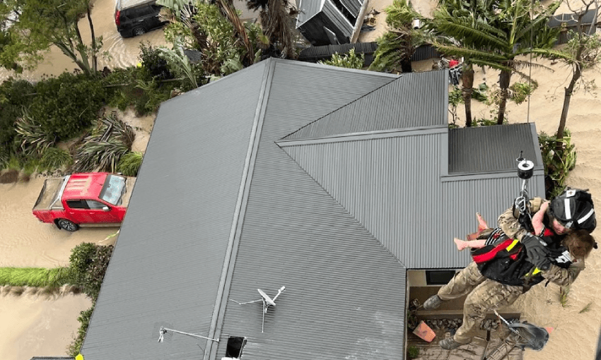Rooftop rescues by the Air Force in Esk Valley, Napier (Photo: Royal New Zealand Air Force) 
