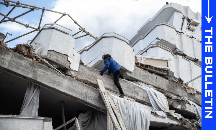 A man searches the collapsed building to hear a sound from his loved ones in Hatay, Turkey (Photo: Burak Kara/Getty Images) 

