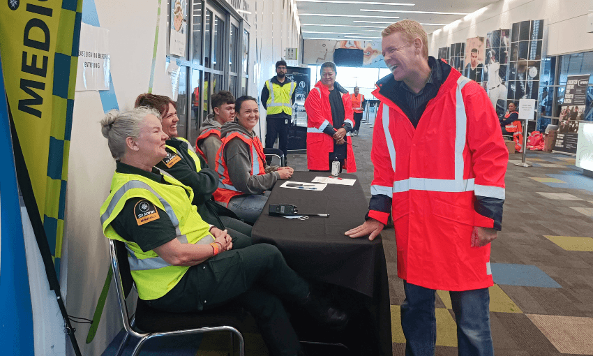 Hipkins speaks to staff and volunteers at the Trusts Arena, which is operating as a Civil Defence Centre during Cyclone Gabrielle. Photo: Toby Manhire.  
