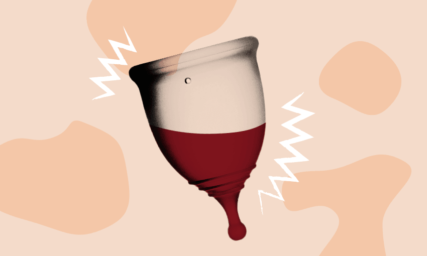 A menstrual cup half filled with blood