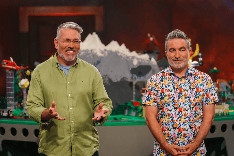 Dai Henwood and Robin Sather stand on the set of Lego Masters NZ