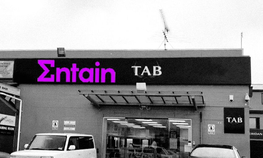 A black and white image of a TAB with the Entain logo over the top in purple