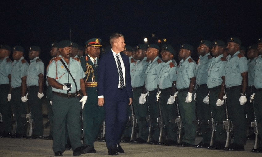Chris Hipkins inspects a guard of honour in Port Moresby