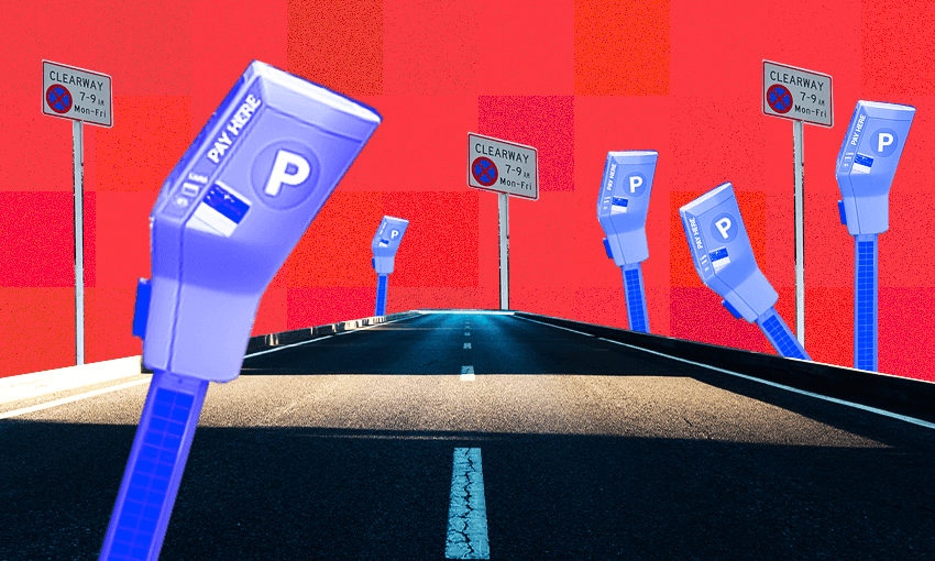 A street lined with parking machines.