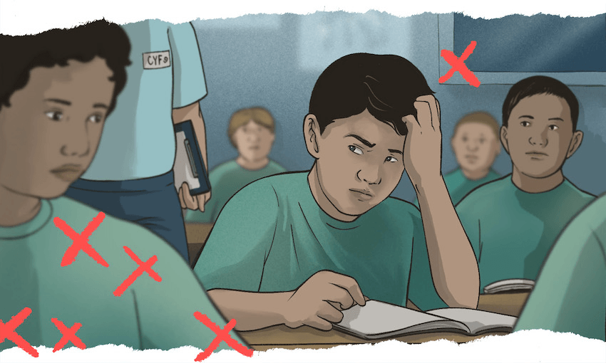 a boy is sitting at a school desk looking anguished, with his hand on his head. An adult wearing a CYFS badge approaches