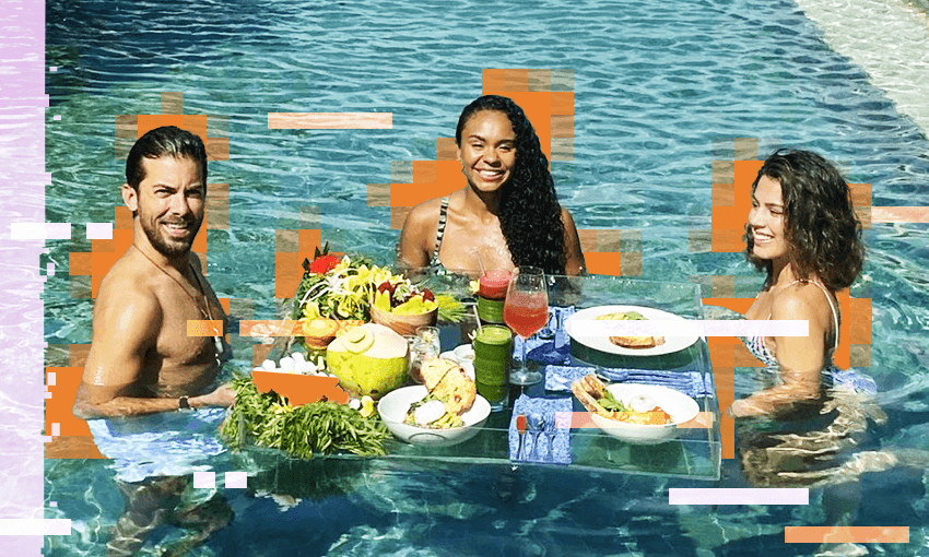 Netflix hosts eat a fruit platter in a pool.