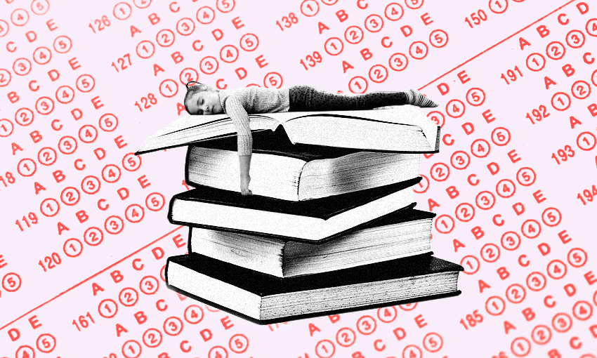 girl asleep on top of a pile of books, test paper background