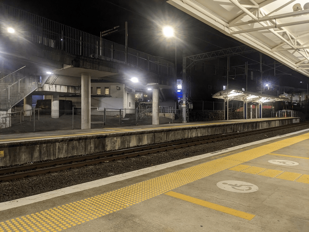 a train station at night 