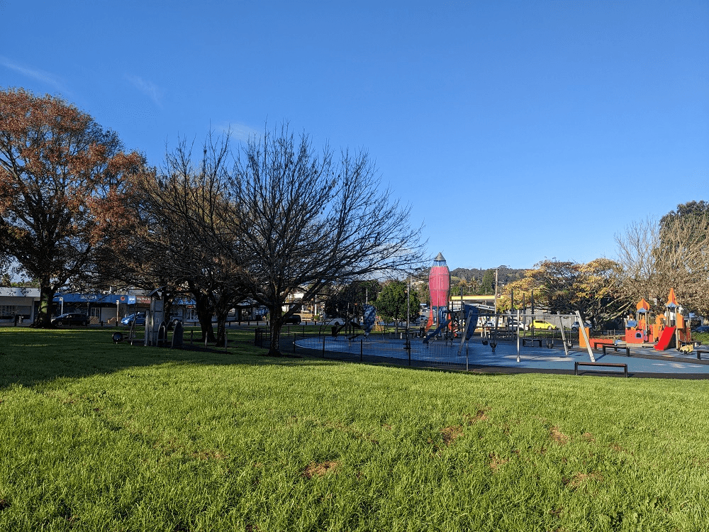 a sunny park and a blue sky