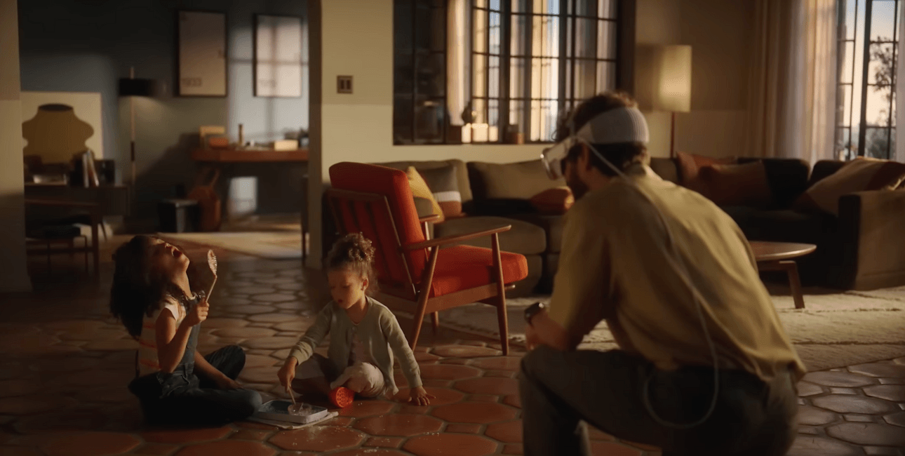 A parent hangs out with their kids using the Apple Vision Pro.